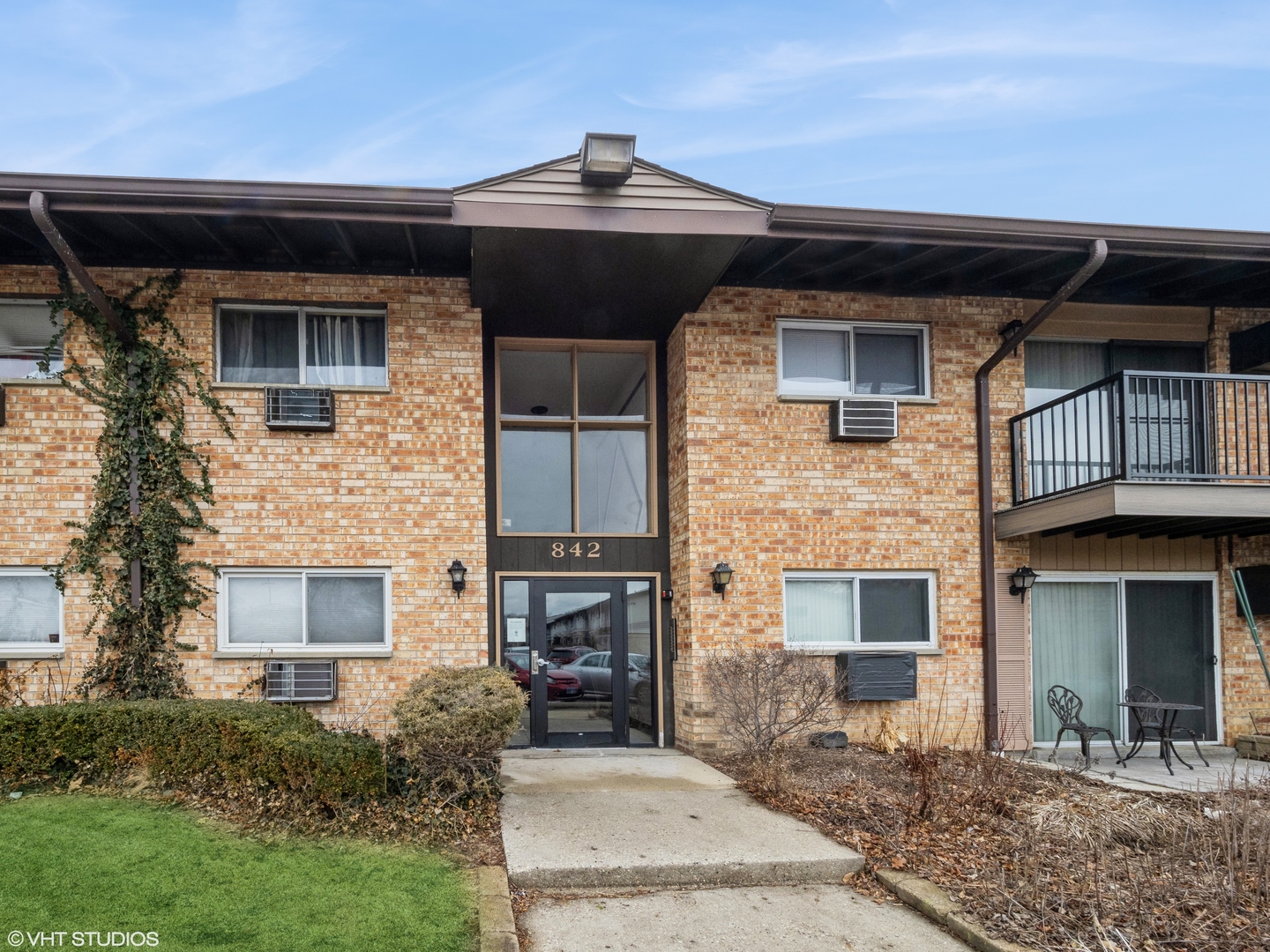 a front view of a house with yard