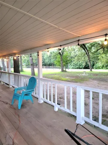 a view of a porch with furniture