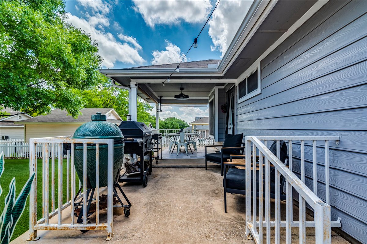 175 Wetzel Kyle, TX 78640 - Photo 25 of 27 An inviting backyard patio and deck combination, perfect for entertaining guests with ample space for grilling and relaxation.