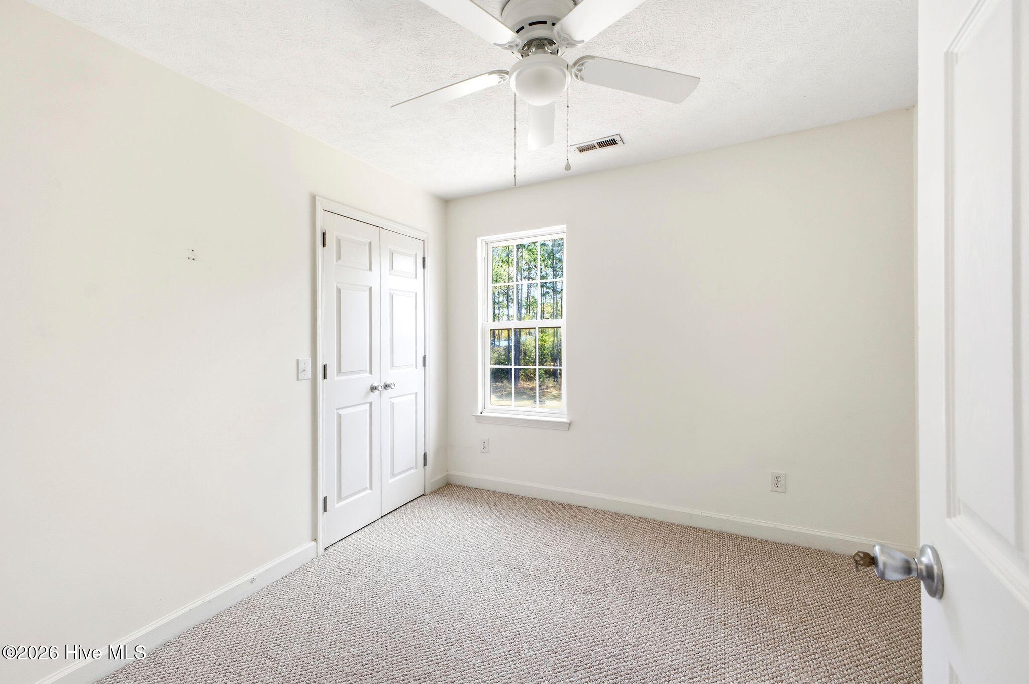 141 Crystal Road Southport, NC 28461 - Photo 25 of 40 141 Crystal Rd bedroom 3