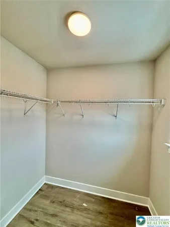 a view of a room with racks on the wall