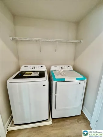 a utility room with dryer and washer
