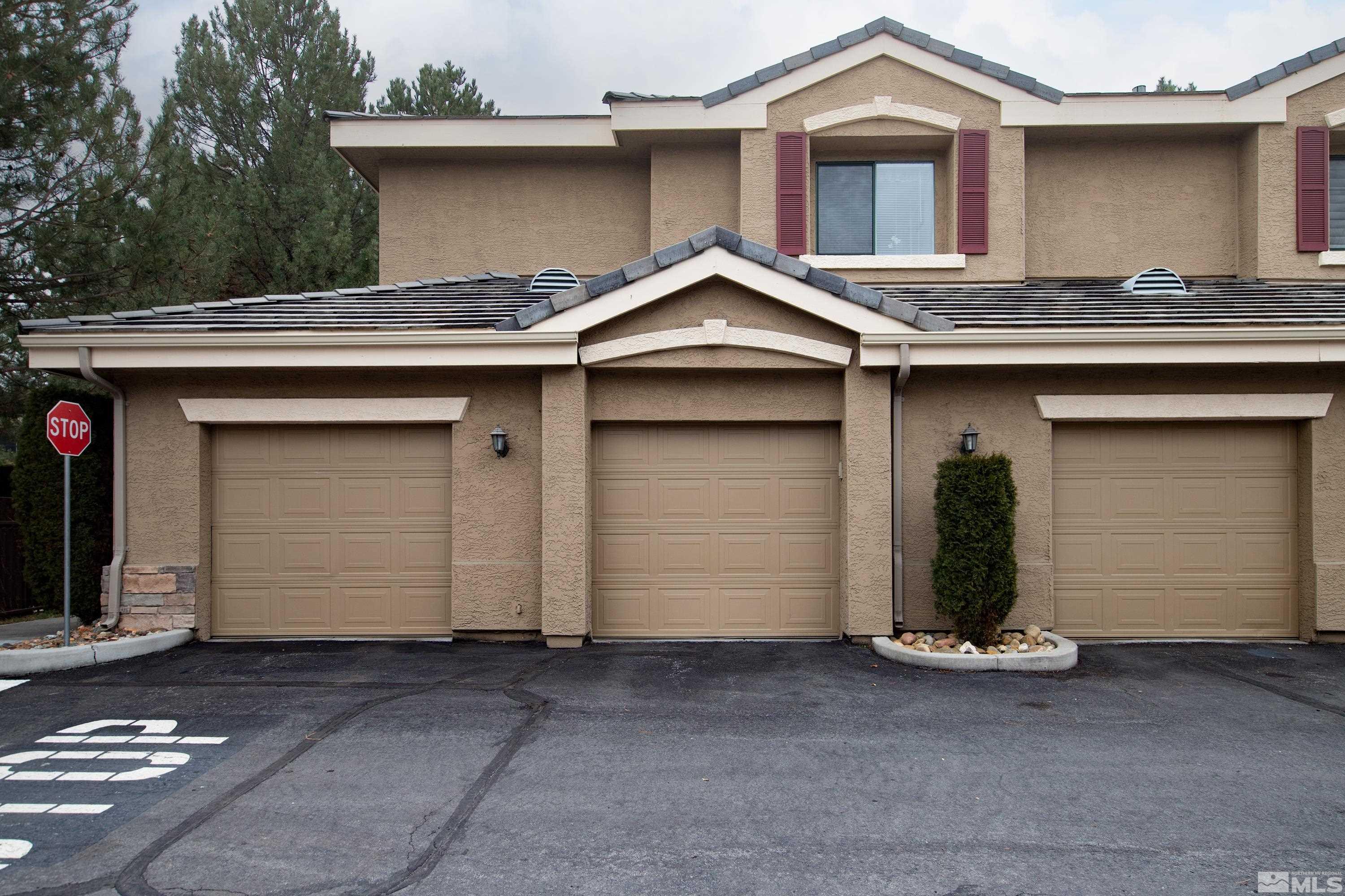900 South Meadows Parkway, Unit 111 Reno, NV 89521 - Photo 1 of 35 a front view of a house