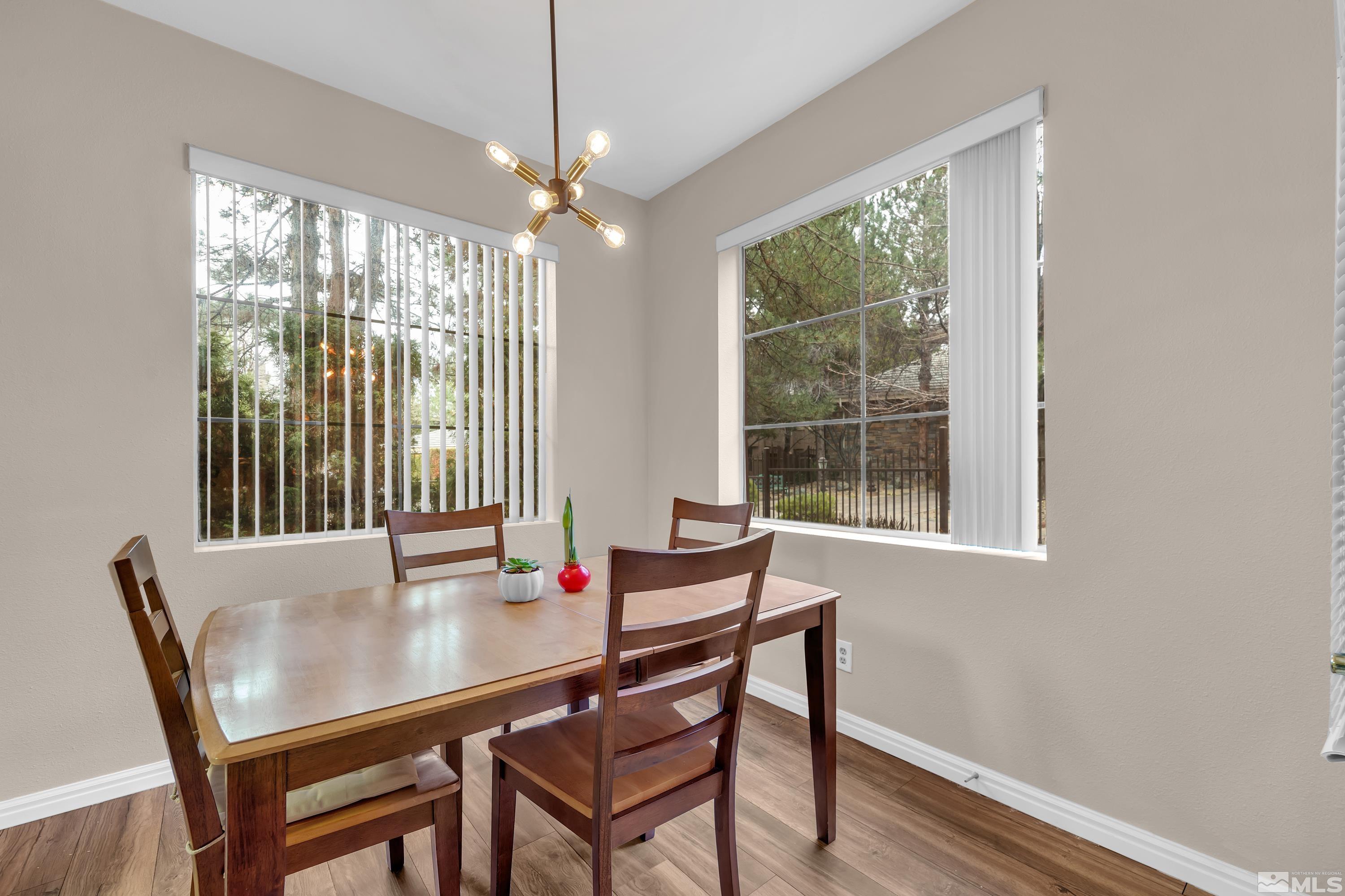 900 South Meadows Parkway, Unit 111 Reno, NV 89521 - Photo 13 of 35 a view of a dining room with furniture window and outside view