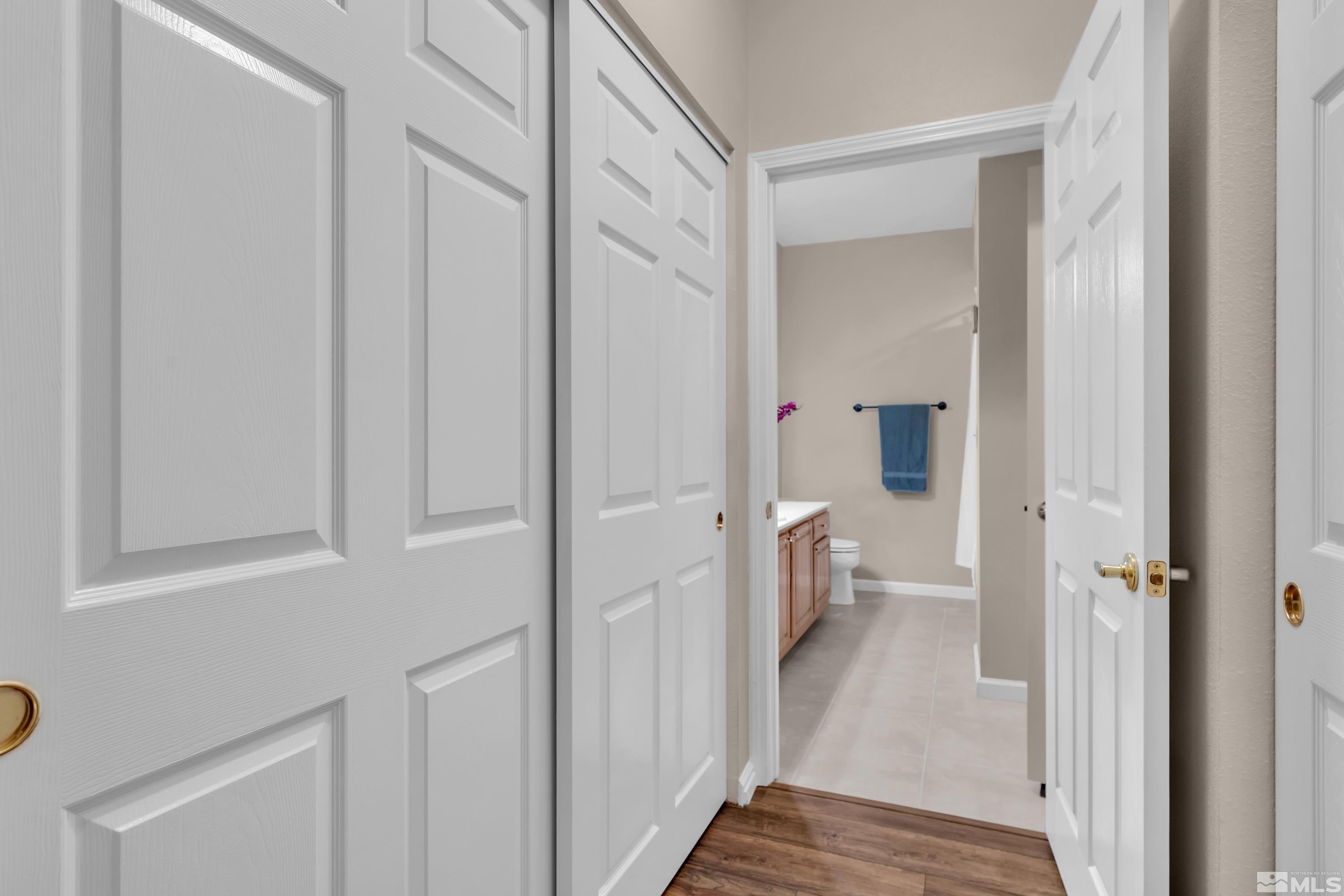900 South Meadows Parkway, Unit 111 Reno, NV 89521 - Photo 20 of 35 a view of a bathroom from the hallway
