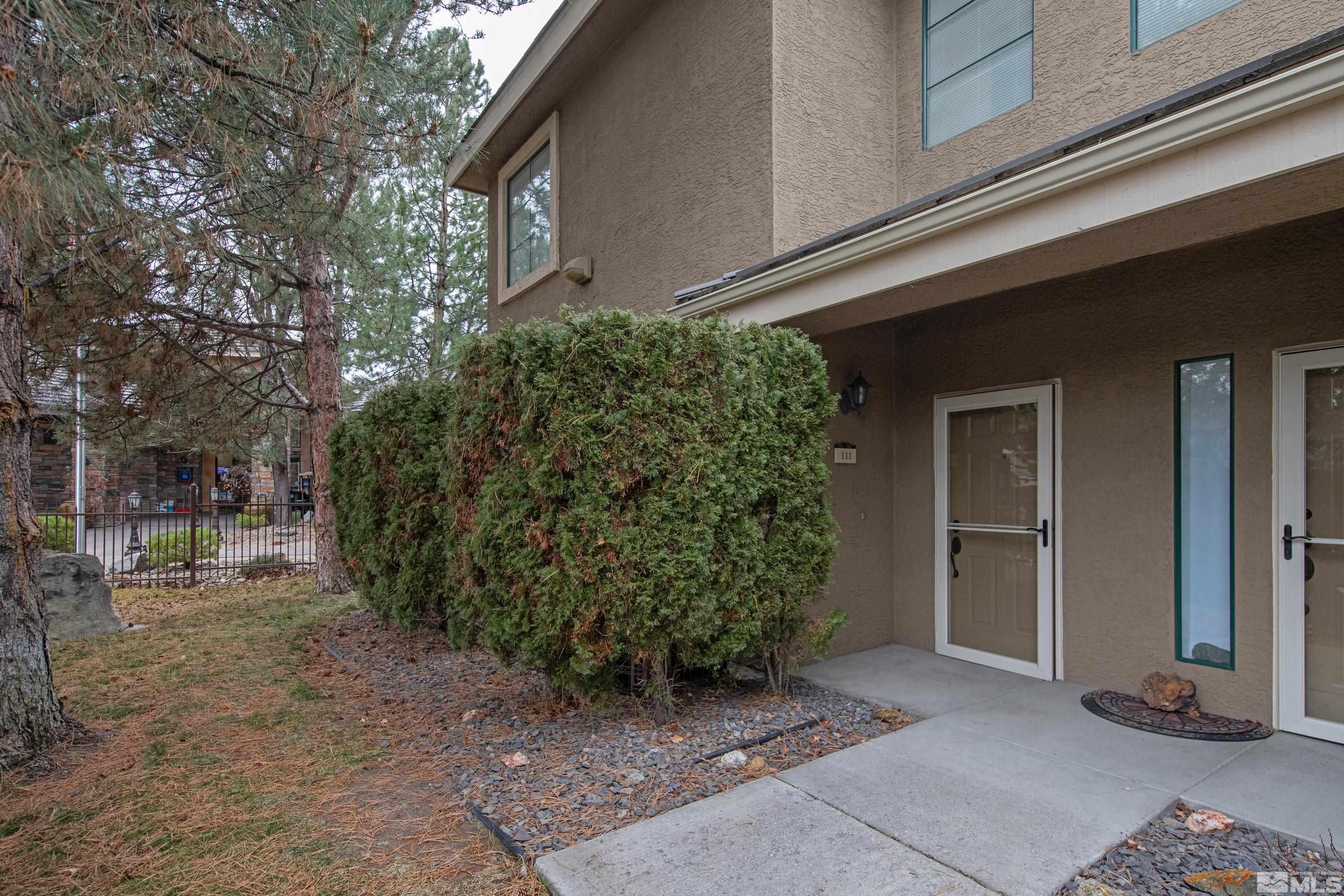 900 South Meadows Parkway, Unit 111 Reno, NV 89521 - Photo 24 of 35 a view of a house with a yard