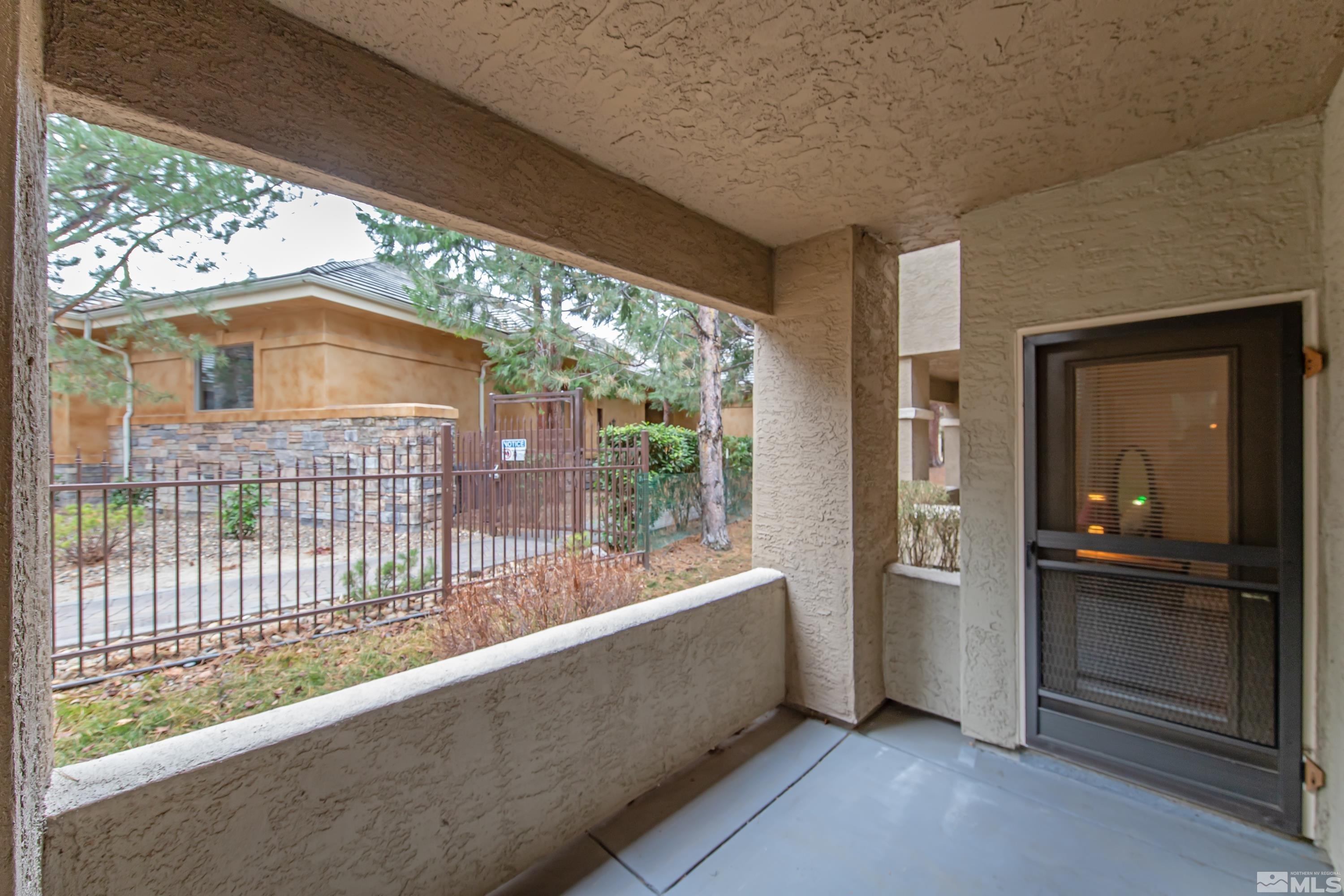 900 South Meadows Parkway, Unit 111 Reno, NV 89521 - Photo 25 of 35 a view of a house with a porch