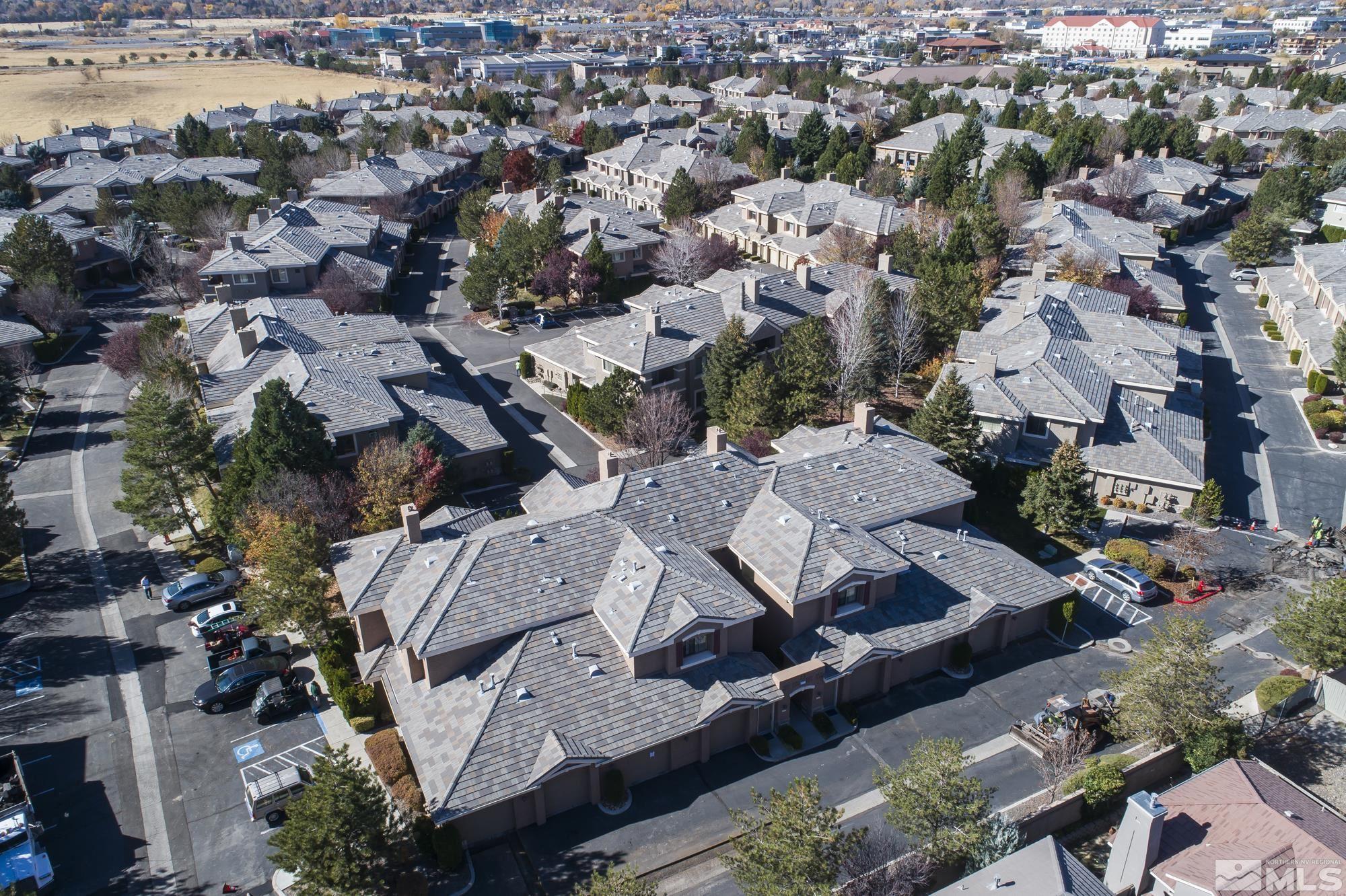 900 South Meadows Parkway, Unit 111 Reno, NV 89521 - Photo 29 of 35 an aerial view of a city with lots of residential buildings
