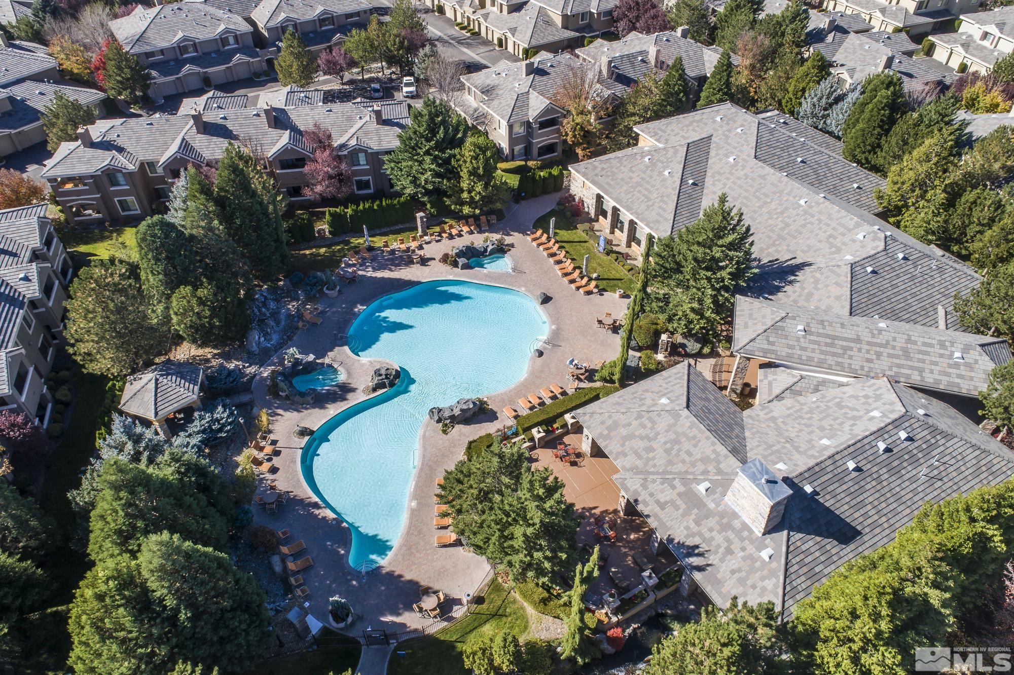 900 South Meadows Parkway, Unit 111 Reno, NV 89521 - Photo 30 of 35 an aerial view of a house with a swimming pool