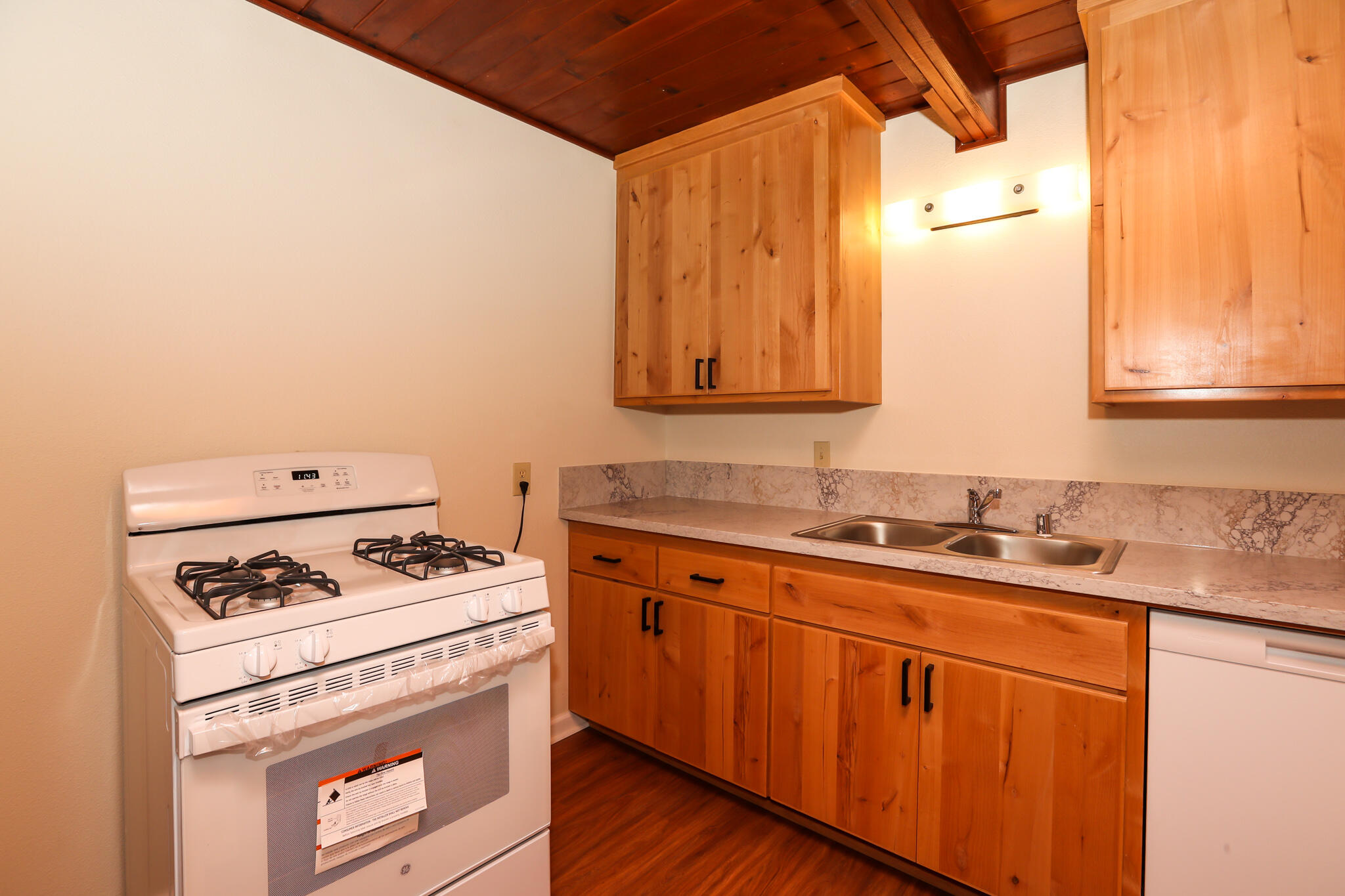 2867 Pinto Lane Anderson, CA 96007 - Photo 16 of 35 a kitchen with granite countertop cabinets stainless steel appliances and a sink