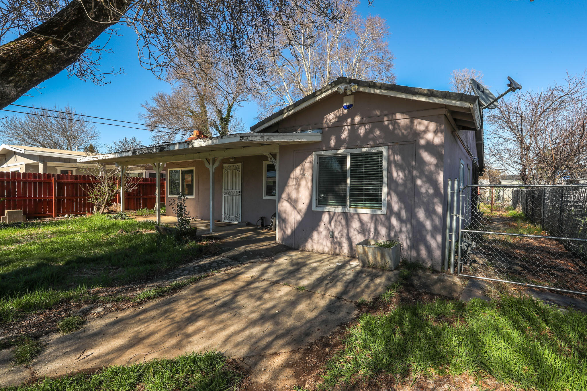 2867 Pinto Lane Anderson, CA 96007 - Photo 2 of 35 a front view of a house with garden