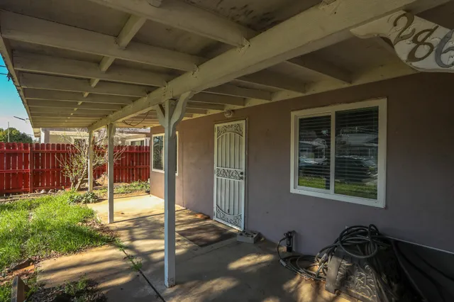 a view of a backyard of a house