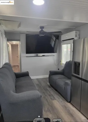 a living room with furniture and a couch