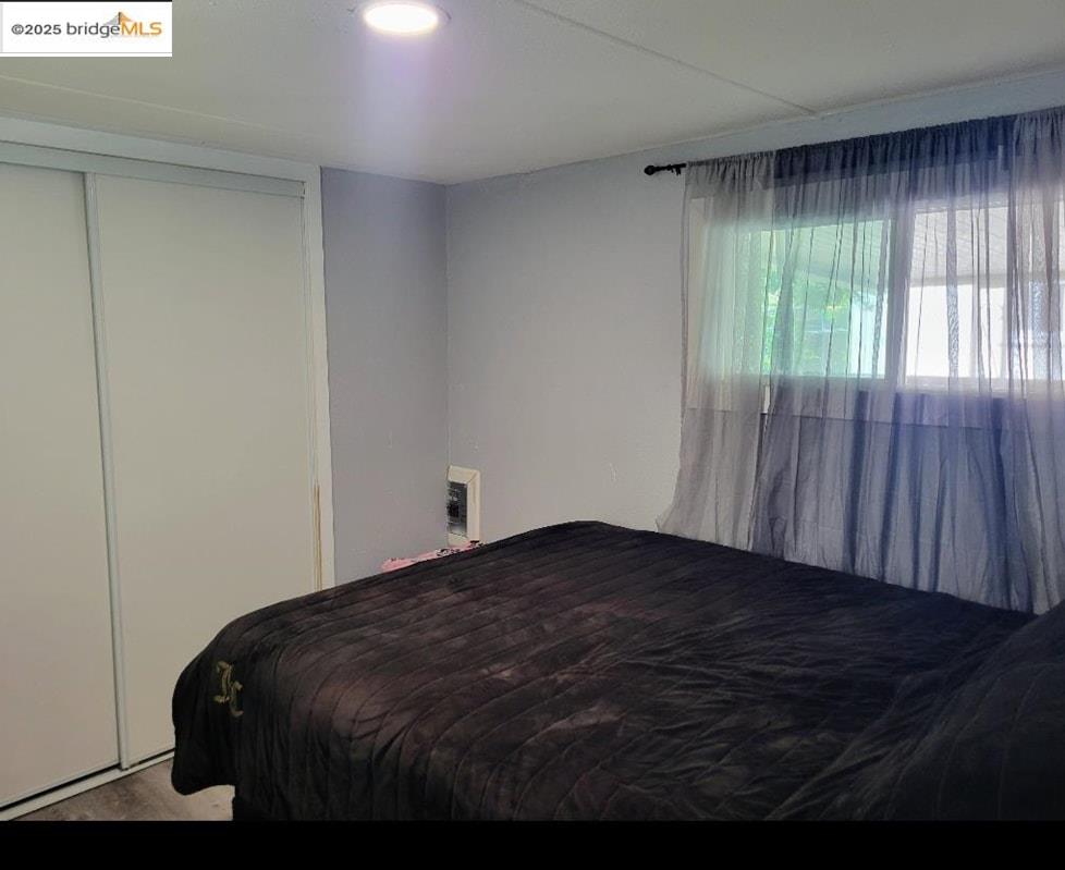 4400 Gateway Road, Unit 38 Bethel Island, CA 94511 - Photo 7 of 10 a bedroom with a bed and a window