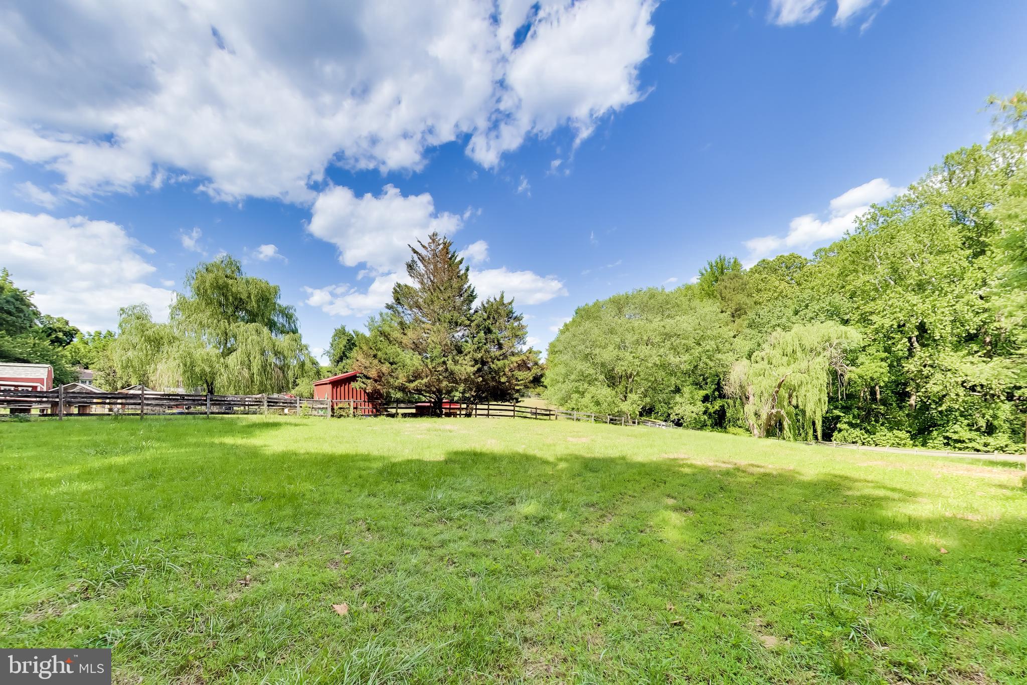 3240 Juniper Lane Huntingtown, MD 20639 - Photo 32 of 48 a view of grassy field with trees