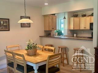 274 Route 65 Route, Unit 41 Hensonville, NY 12439 - Photo 11 of 28 a kitchen with a table and chairs in it