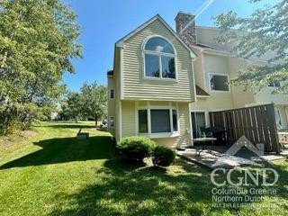 274 Route 65 Route, Unit 41 Hensonville, NY 12439 - Photo 3 of 28 a front view of a house with garden