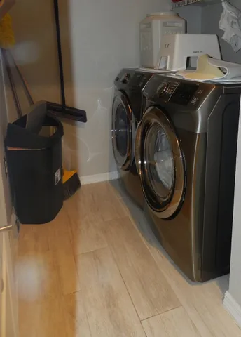 a utility room with dryer and washer