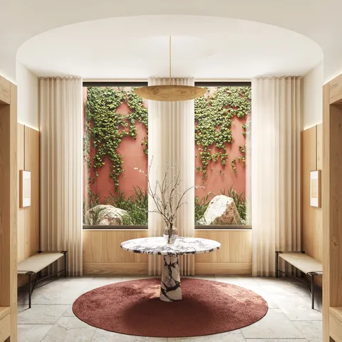 a living room with a large window and table