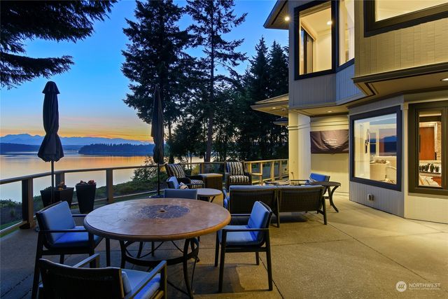 a view of a lake with a yard