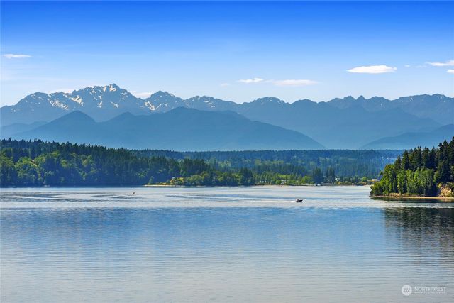 a view of ocean with sunset
