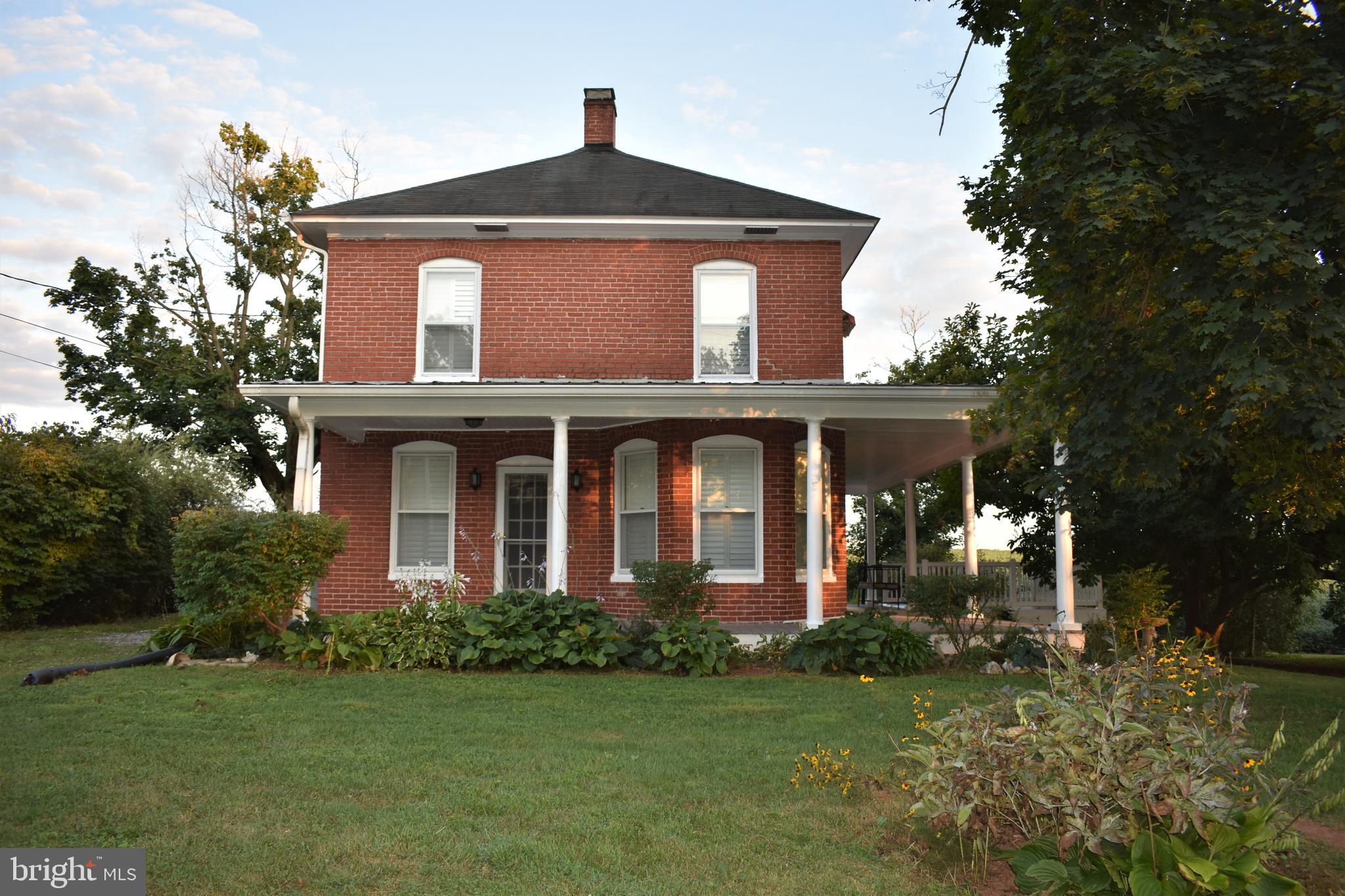 5619 A Jefferson Pike Frederick, MD 21703 - Photo 11 of 57 a front view of a house with garden