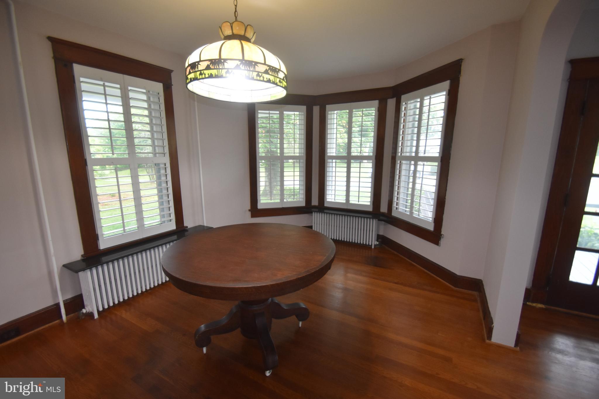 5619 A Jefferson Pike Frederick, MD 21703 - Photo 17 of 57 a view of a room with furniture window and wooden floor