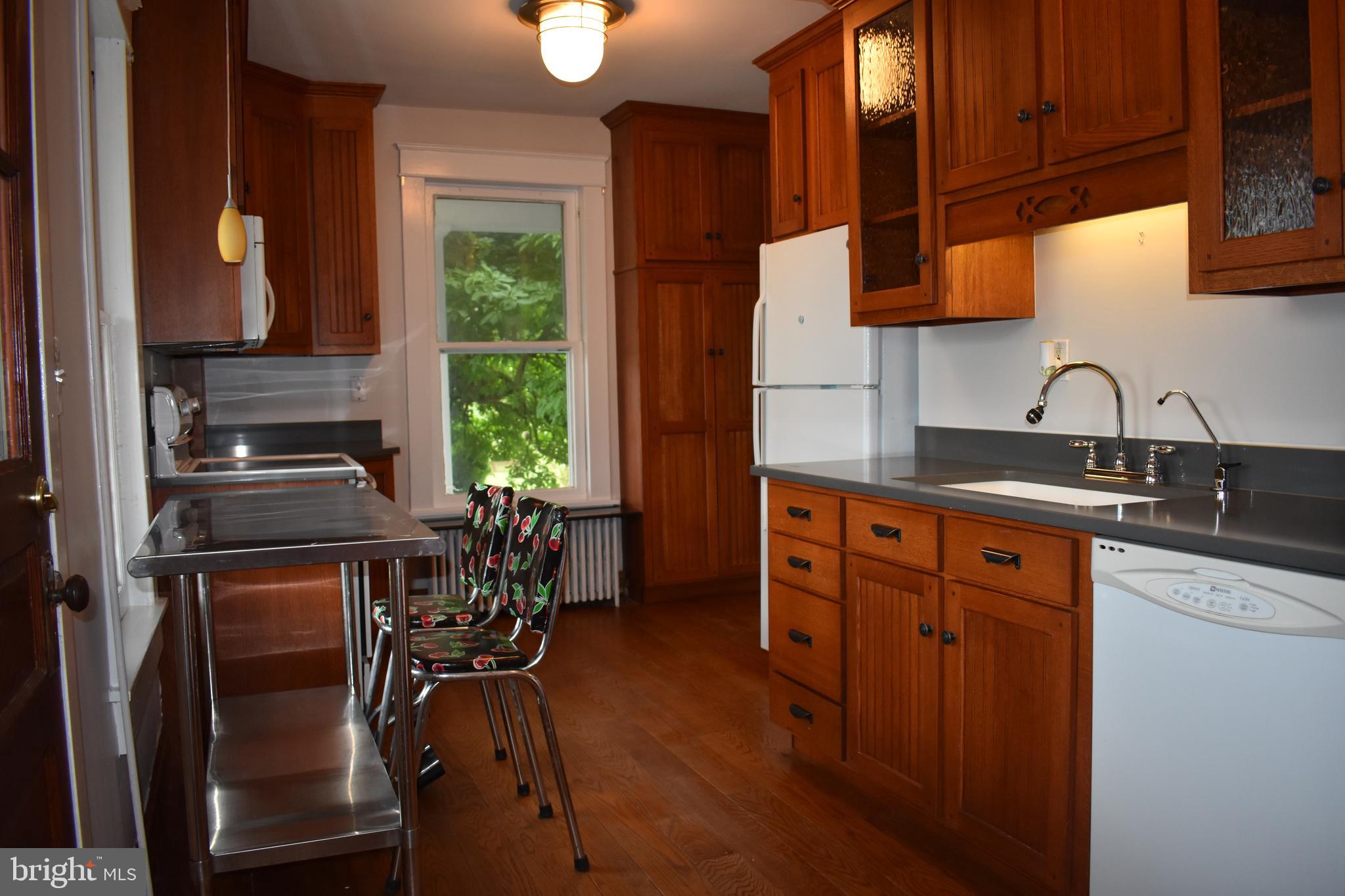 5619 A Jefferson Pike Frederick, MD 21703 - Photo 19 of 57 a kitchen with stainless steel appliances granite countertop a sink stove and cabinets