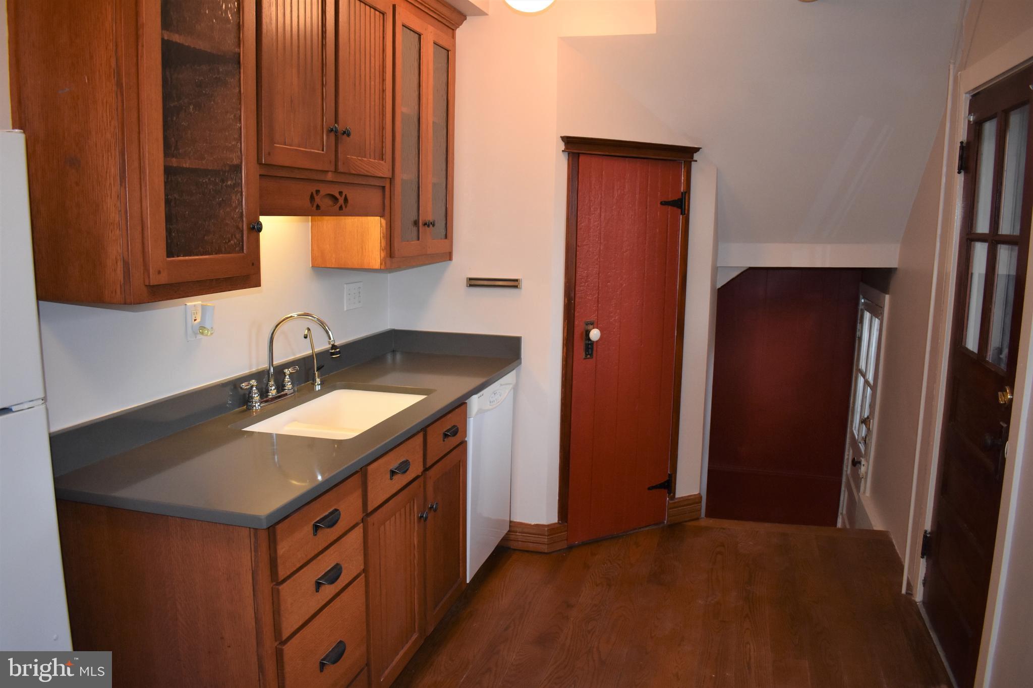 5619 A Jefferson Pike Frederick, MD 21703 - Photo 25 of 57 a kitchen with a sink stove and cabinets