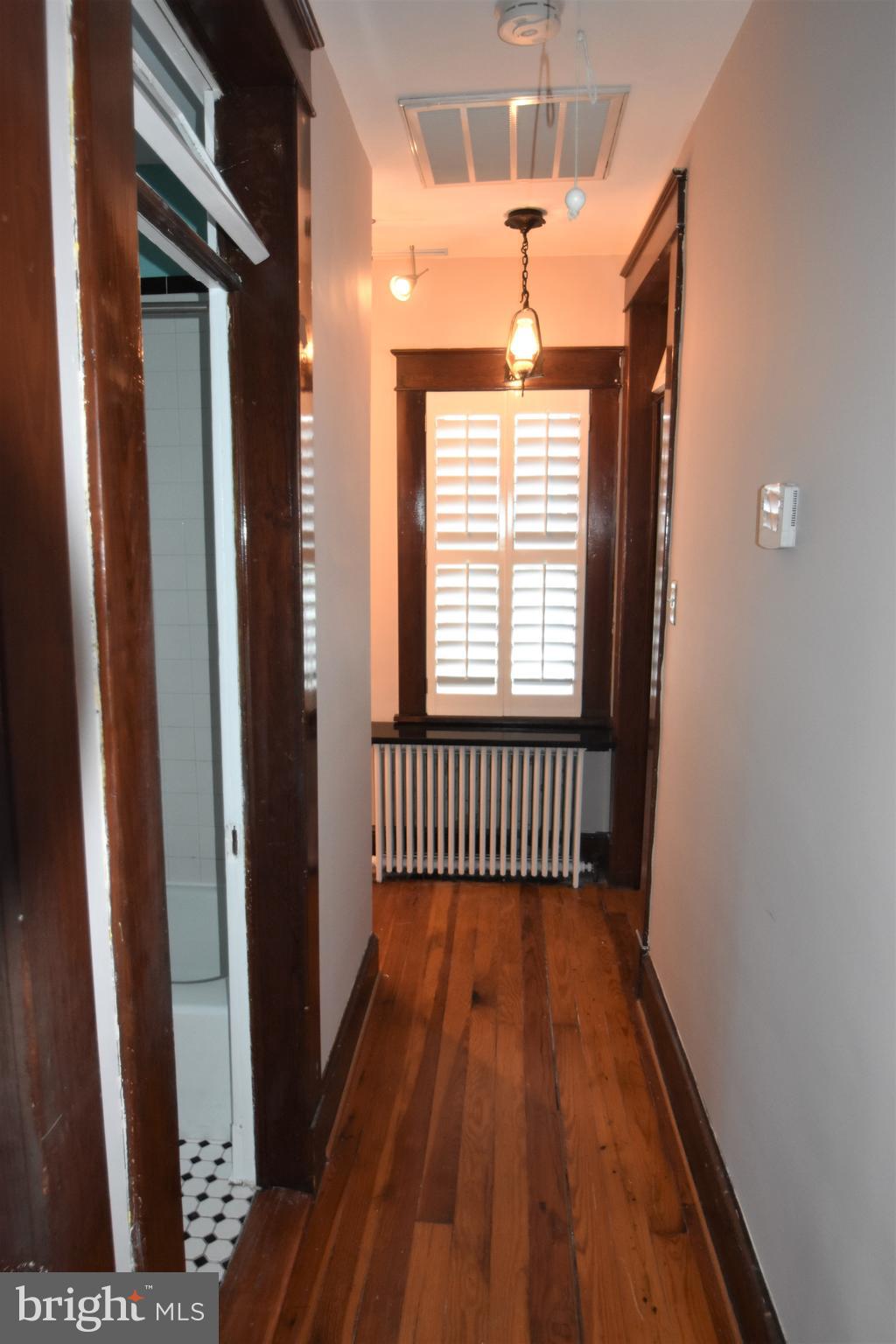 5619 A Jefferson Pike Frederick, MD 21703 - Photo 39 of 57 a view of a room with wooden floor and windows