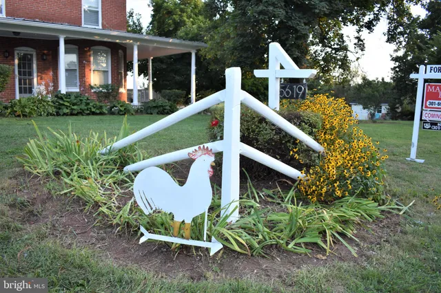 a view of a balcony with wooden floor