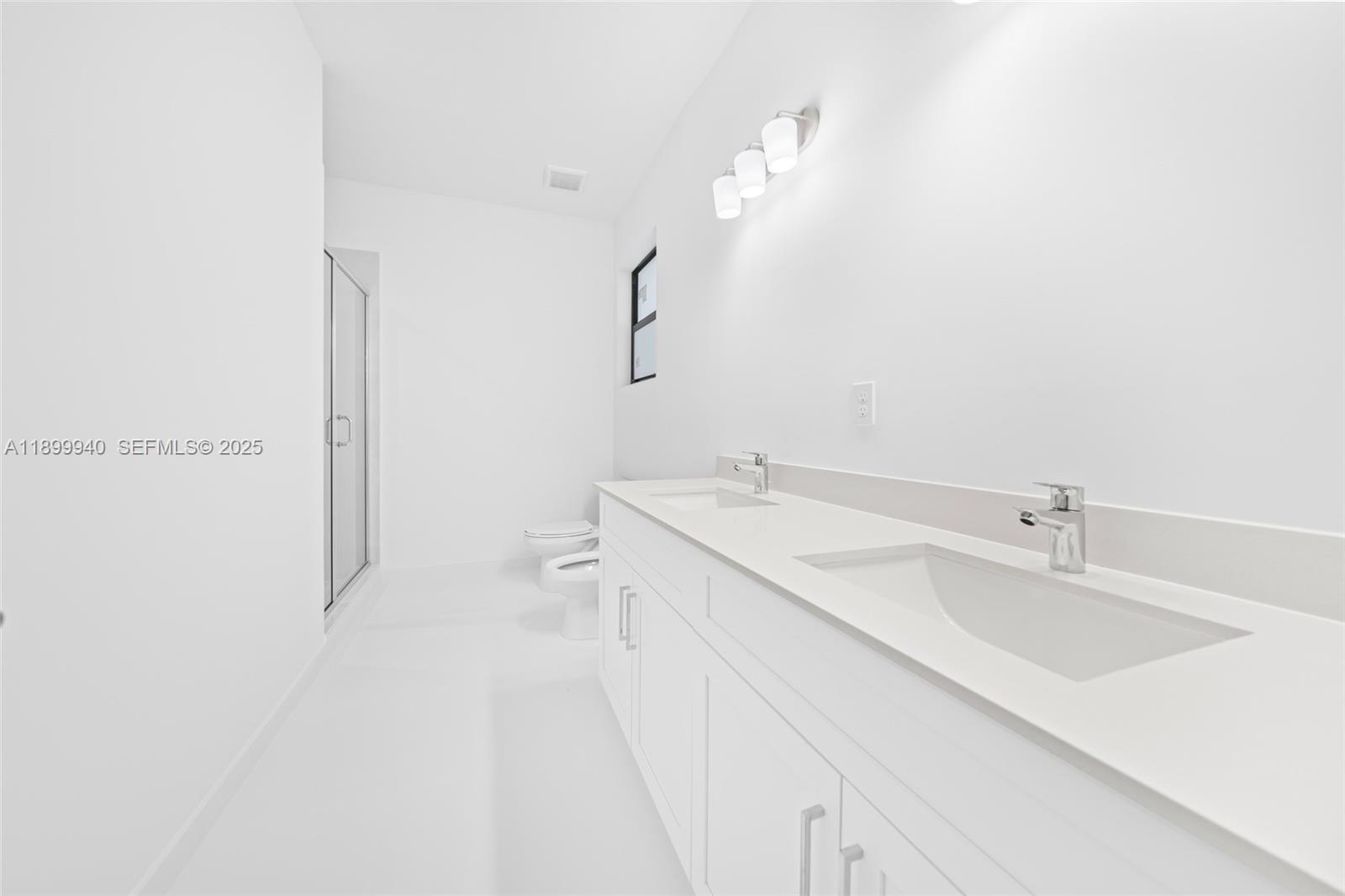 19504 Southwest 324th Street Homestead, FL 33030 - Photo 16 of 46 Master Double sink and shower