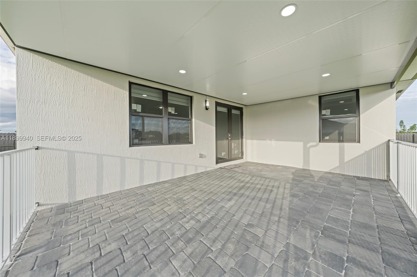 19504 Southwest 324th Street Homestead, FL 33030 - Photo 41 of 46 Gated covered terrace w/ lights