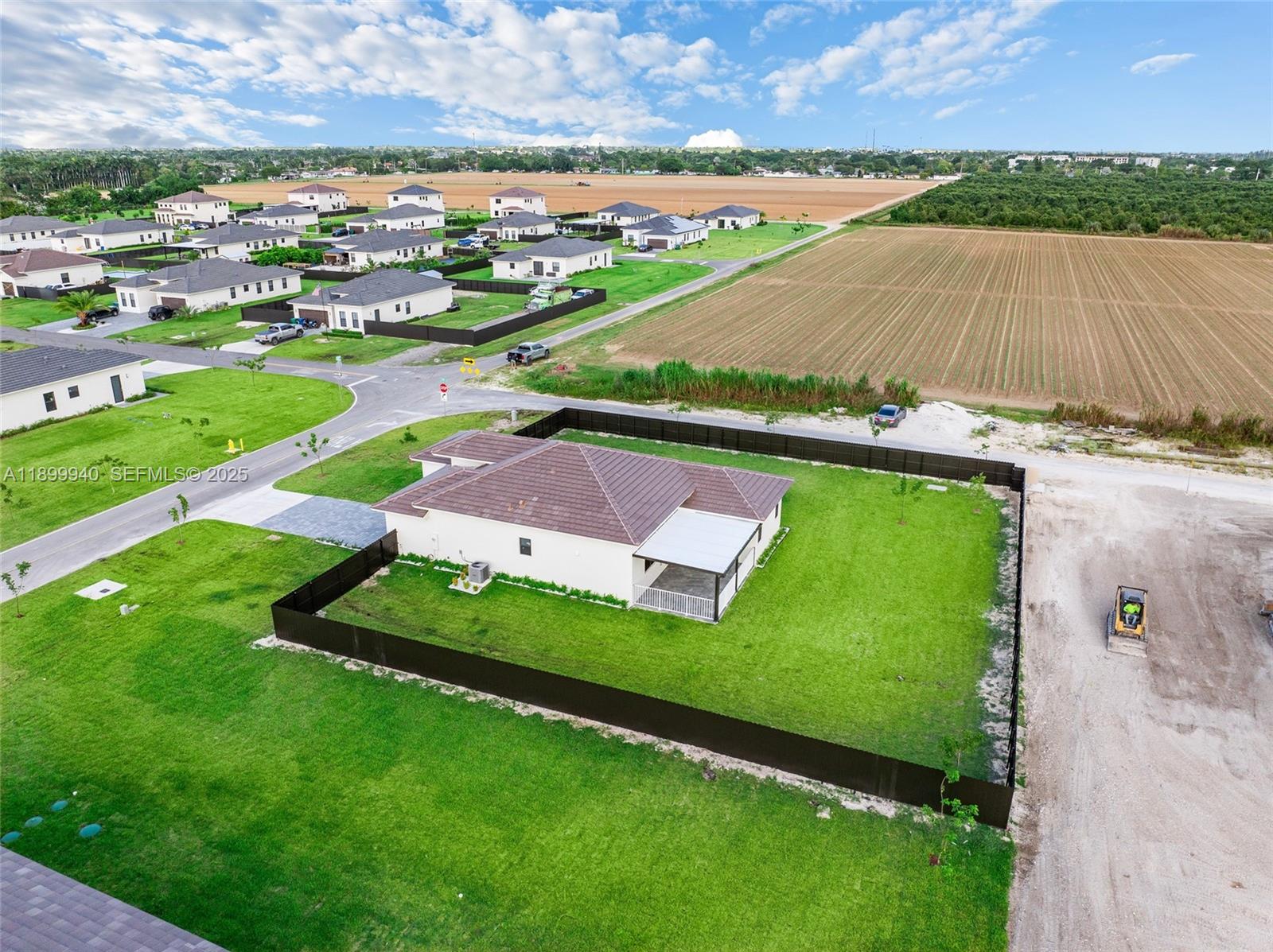 19504 Southwest 324th Street Homestead, FL 33030 - Photo 5 of 46 side view and surrounding new construction homes
