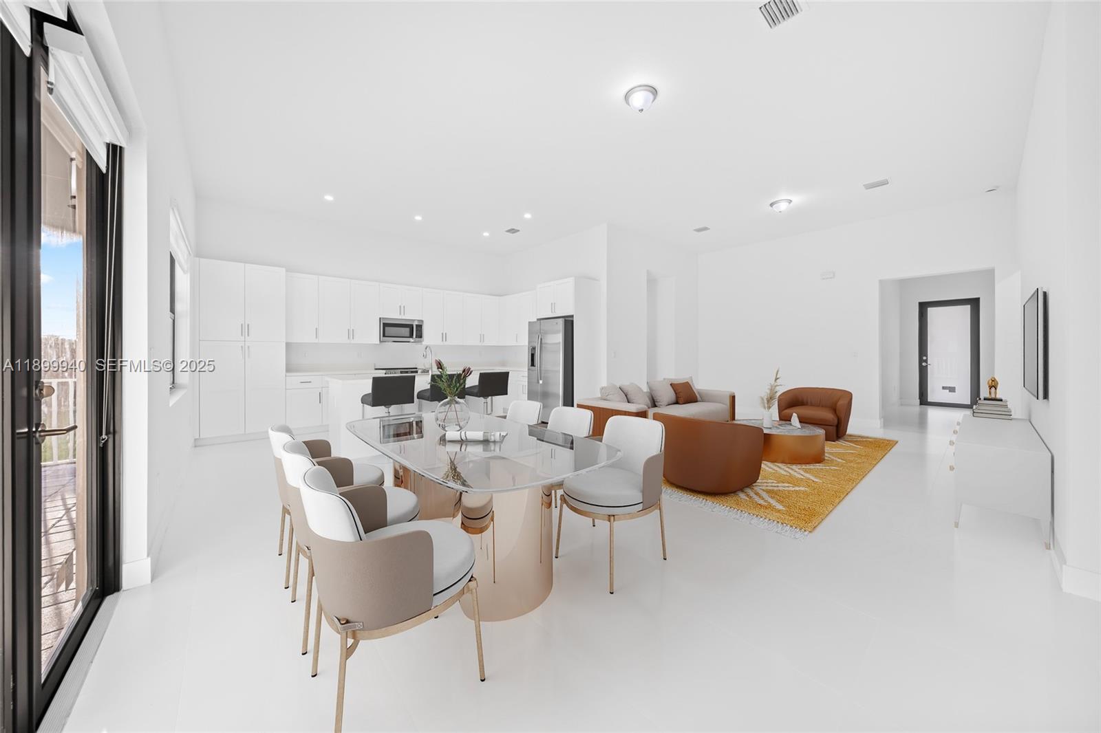 19504 Southwest 324th Street Homestead, FL 33030 - Photo 10 of 46 Great Room virtually staged (view of dining, living, kitchen, foyer)