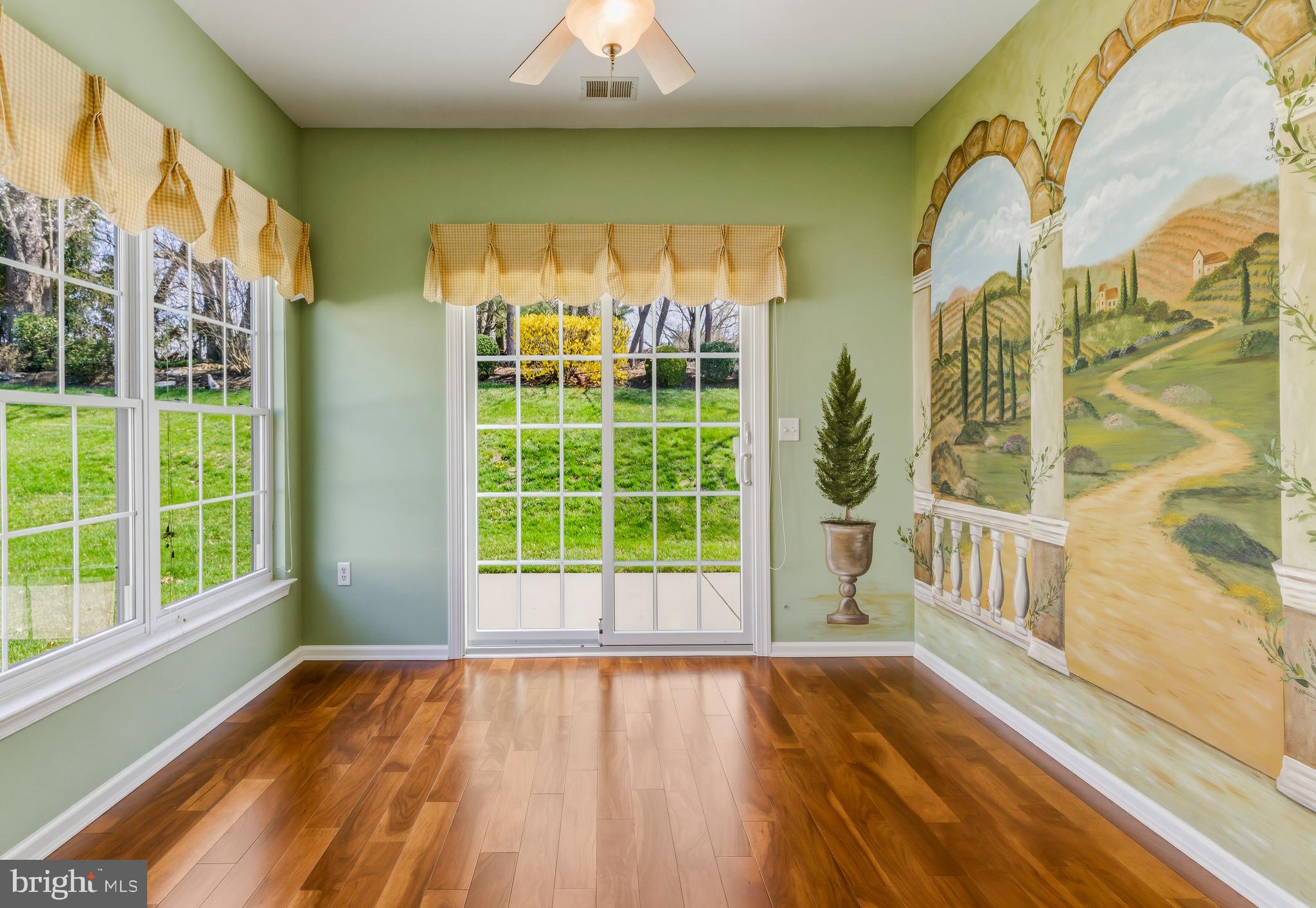106 York Road West Deptford, NJ 08086 - Photo 19 of 31 a view of an empty room with a window and wooden floor