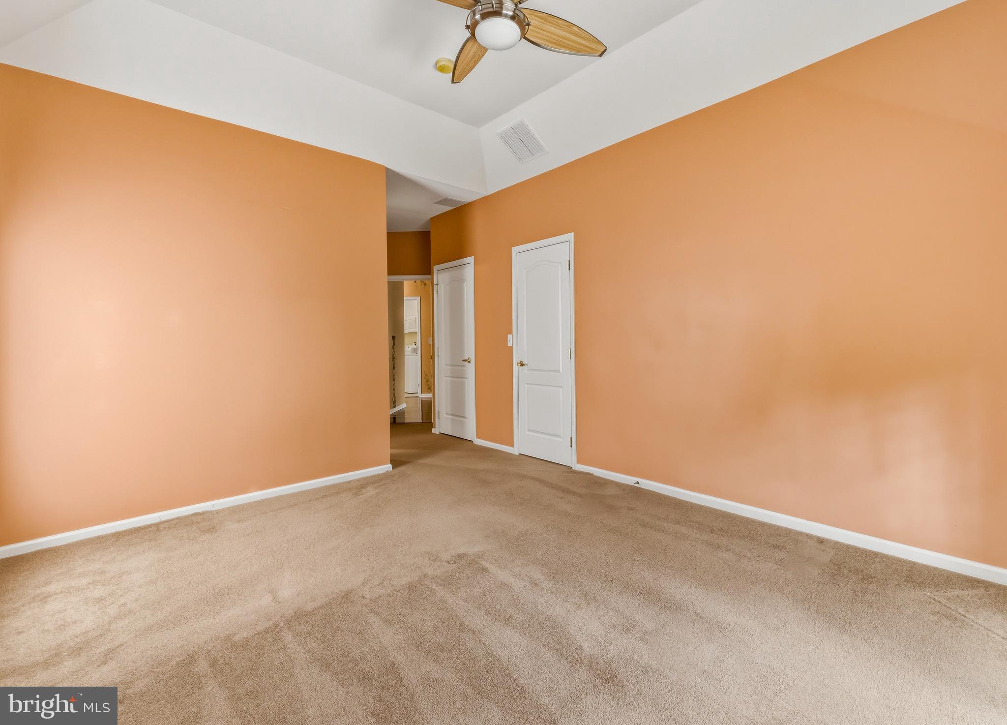 106 York Road West Deptford, NJ 08086 - Photo 23 of 31 an empty room with a ceiling fan and carpet