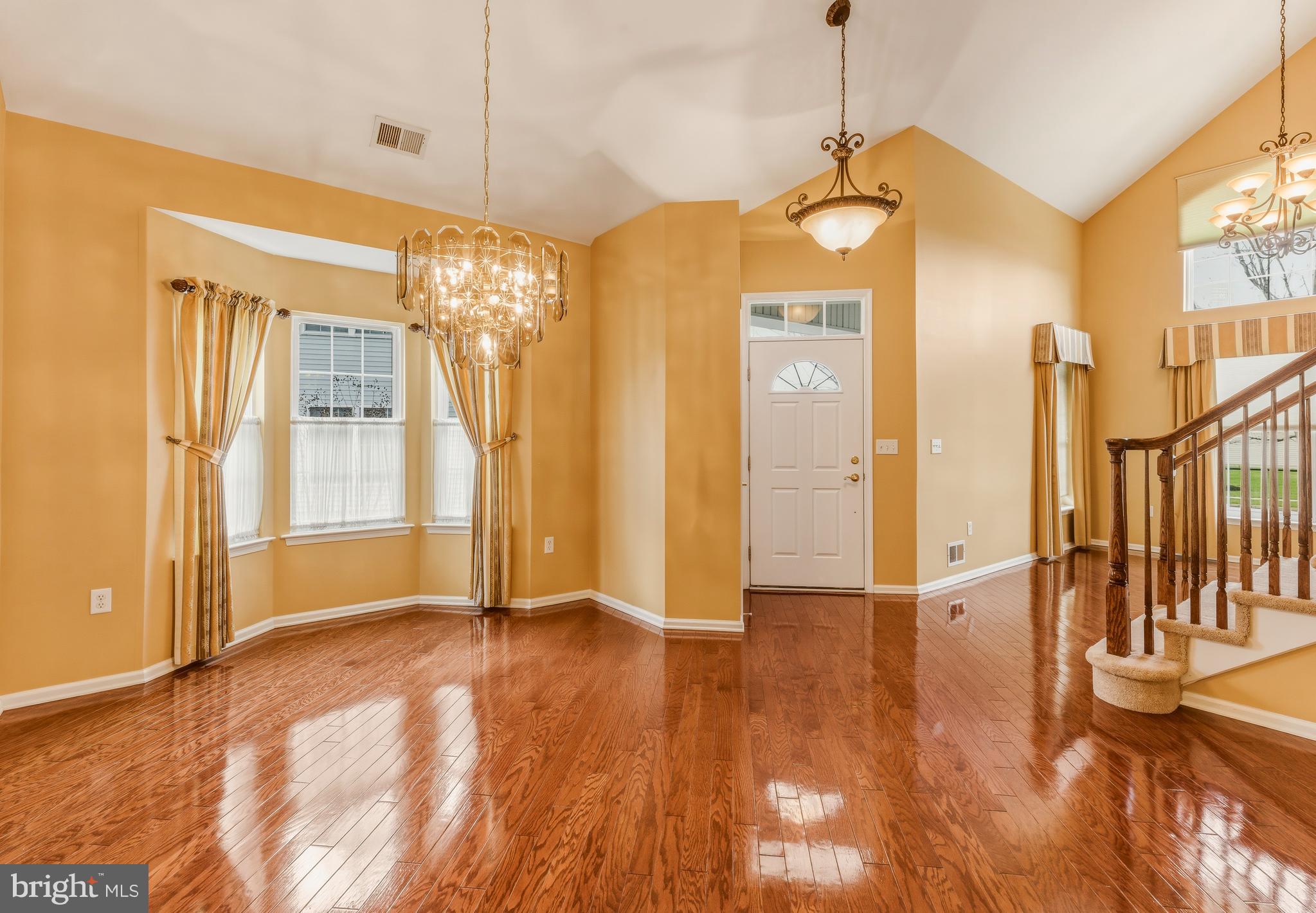106 York Road West Deptford, NJ 08086 - Photo 7 of 31 a view of an empty room with window and wooden floor