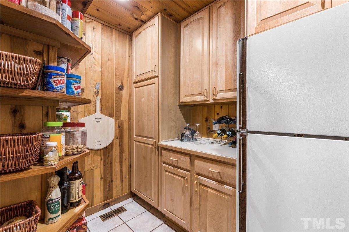 1625 Rougemont Road Rougemont, NC 27572 - Photo 15 of 30 a kitchen with refrigerator and cabinets