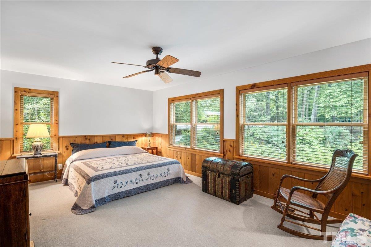 1625 Rougemont Road Rougemont, NC 27572 - Photo 17 of 30 a bedroom with a bed and a couch
