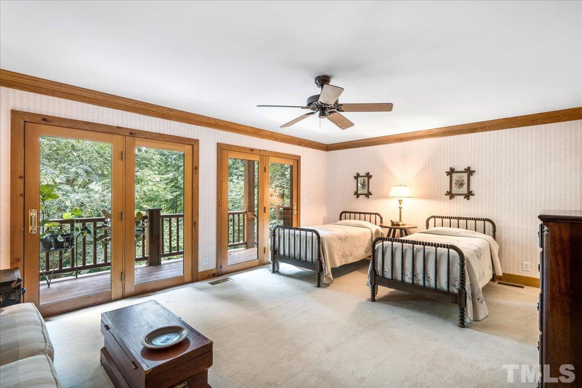 1625 Rougemont Road Rougemont, NC 27572 - Photo 20 of 30 a bedroom with furniture and a large window