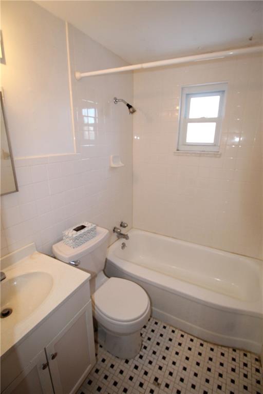 162 Castle Road Pittsburgh, PA 15234 - Photo 11 of 18 Crisp white main bath with ceramic tile.