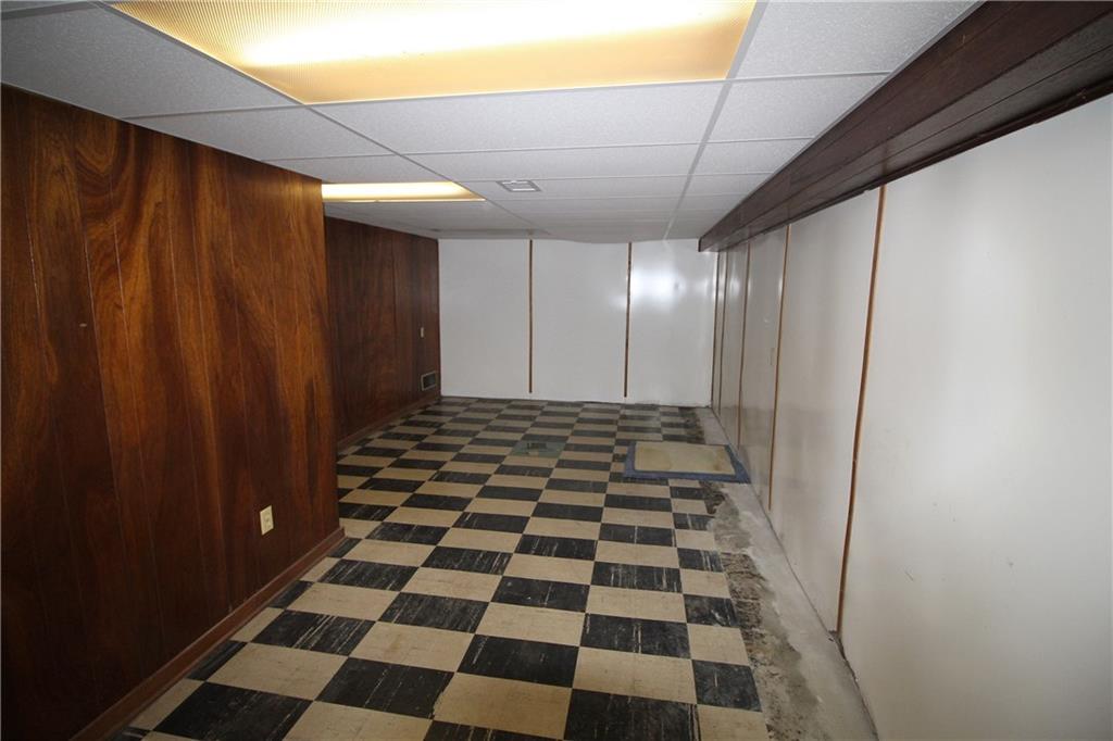 162 Castle Road Pittsburgh, PA 15234 - Photo 12 of 18 Partially finished game room on the lower level.