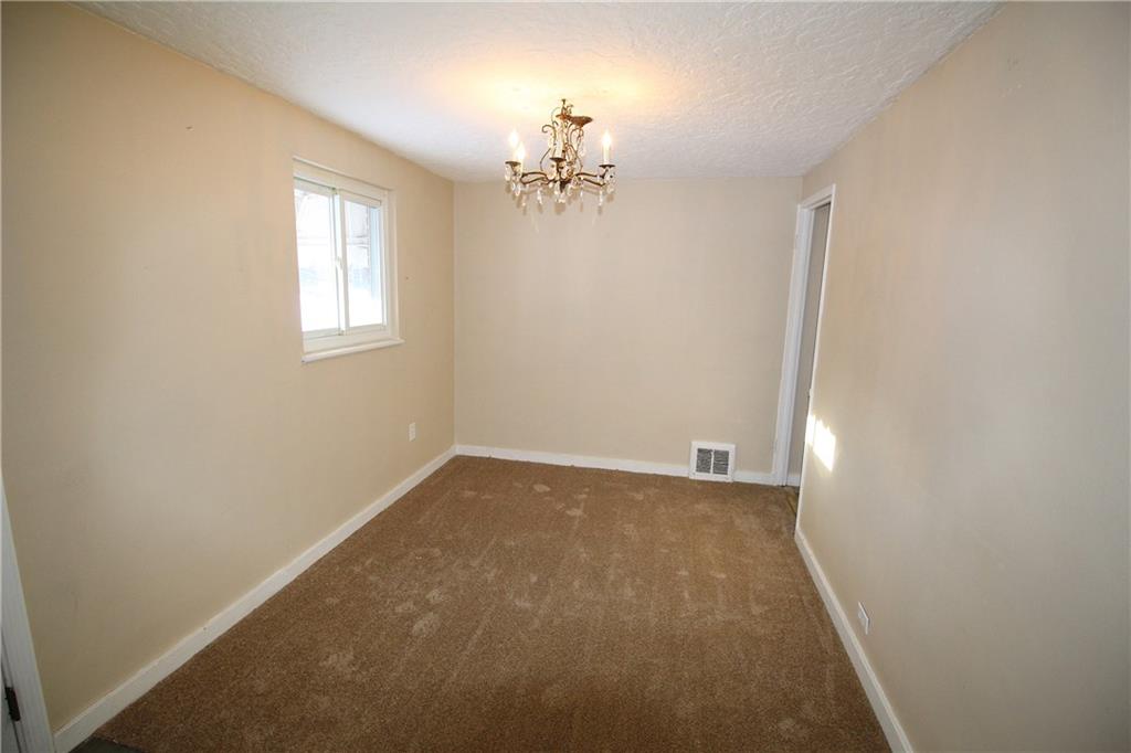 162 Castle Road Pittsburgh, PA 15234 - Photo 3 of 18 New carpeting in the dining room too.
