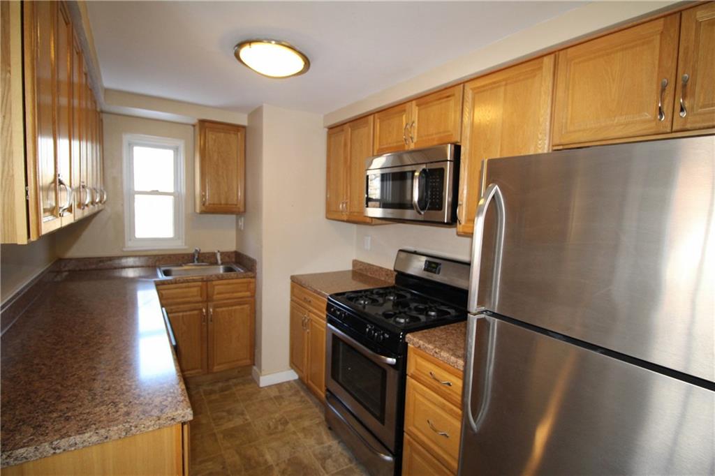 162 Castle Road Pittsburgh, PA 15234 - Photo 6 of 18 Newer kitchen has lots of cabinets.