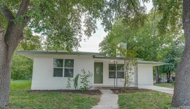 front view of a house with a yard