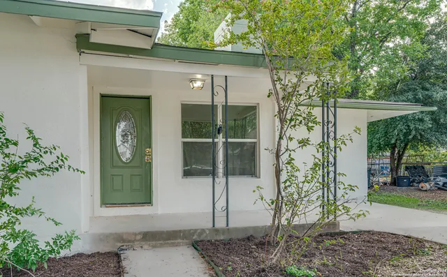a front view of a house with a porch