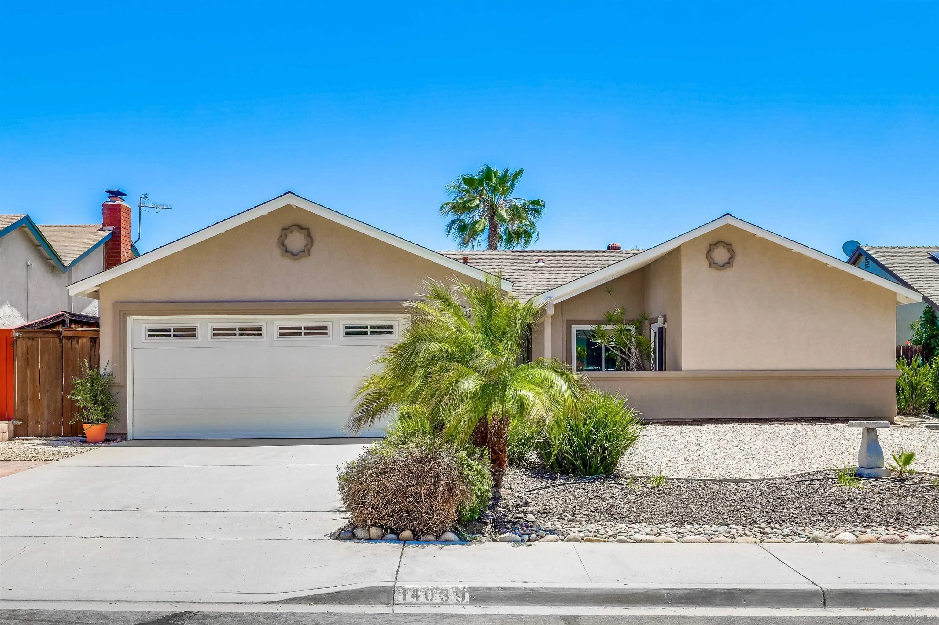 14039 Hermosillo Way Poway, CA 92064 - Photo 23 of 31 a front view of a house with plants