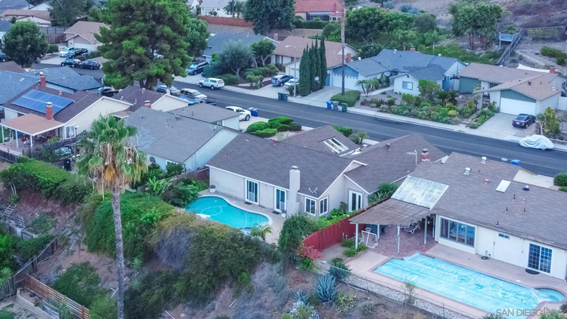 14039 Hermosillo Way Poway, CA 92064 - Photo 27 of 31 an aerial view of multiple houses with a yard