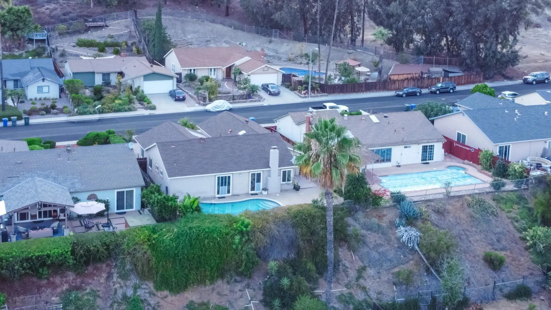 14039 Hermosillo Way Poway, CA 92064 - Photo 28 of 31 an aerial view of a house with a yard